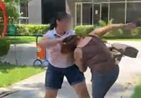 Kocasıyla birlikte parkta bastığı kadını saçından sürükledi