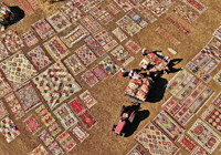 Bu hasat başka! Antalya'da buğday tarlalarındaki halılar toplanıyor