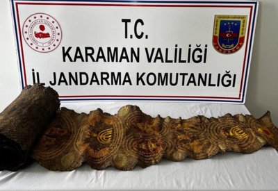 Karaman'da piton derisine yazılı tılsım ele geçirildi