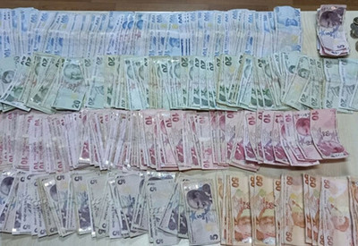 Eskişehir'de dilencinin elindeki poşetten 13 bin 630 lira çıktı