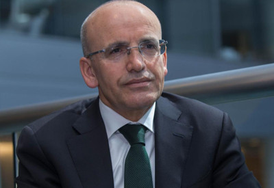 Bakan Şimşek'ten faiz mesajı: Enflasyon oranında düşecek